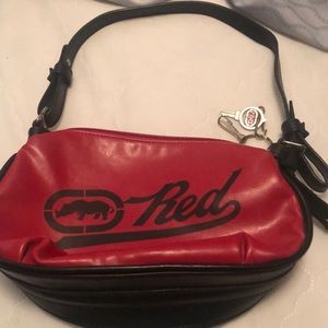 Small purse, can be used over the shoulder or just hand held.